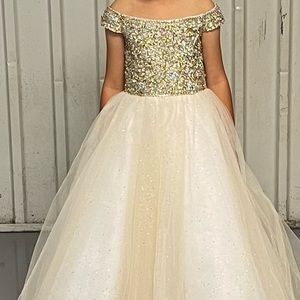 Tiffany Princess Gown. Size 2. Champagne/White. 5T in everyday clothes.